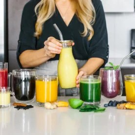 Several anti-inflammatory drinks next to each other on a countertop.