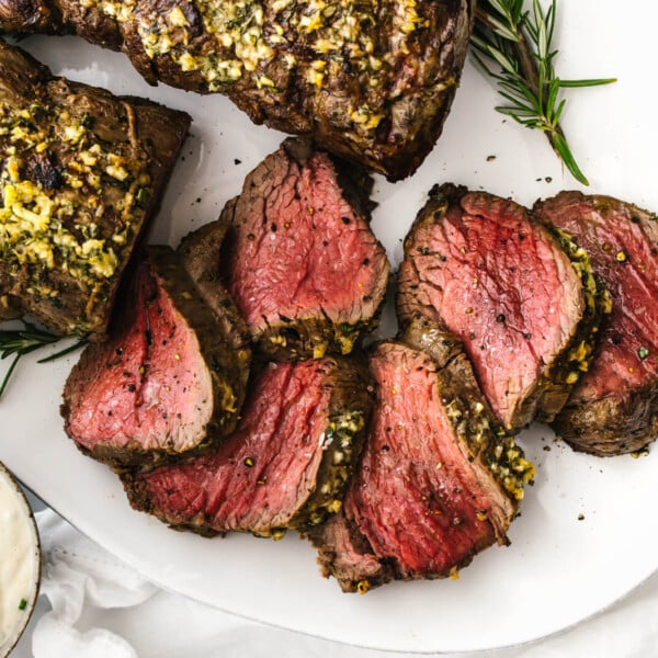 A plate of sliced beef tenderloin roast