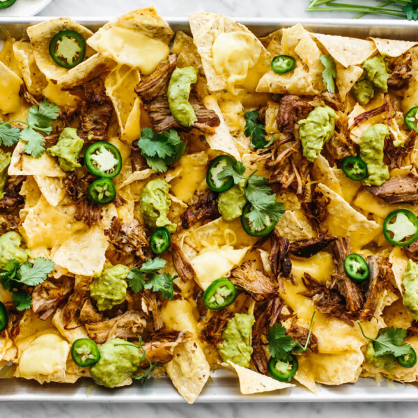 A baking sheet of carnitas nachos