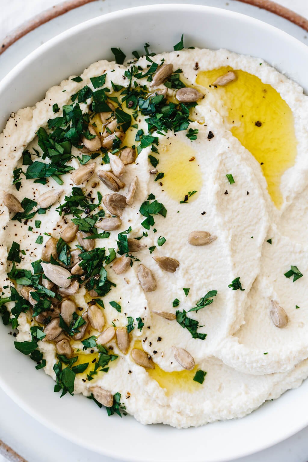 Roasted cauliflower hummus is a delicious chickpea-free version of hummus that's low-carb, keto, paleo and Whole30 friendly.