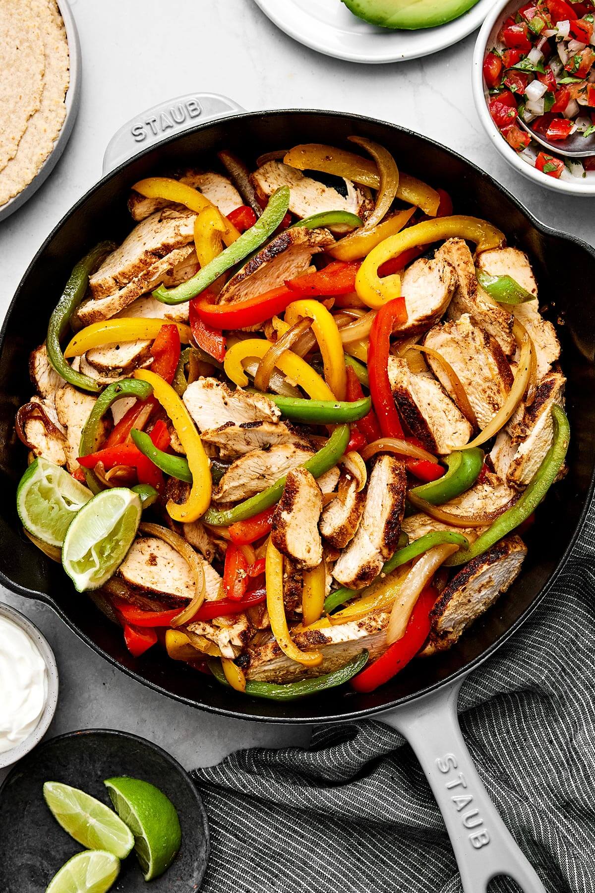 A skillet of chicken fajitas.