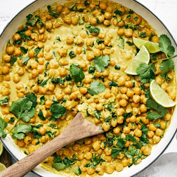 Chickpea curry in a white pan.