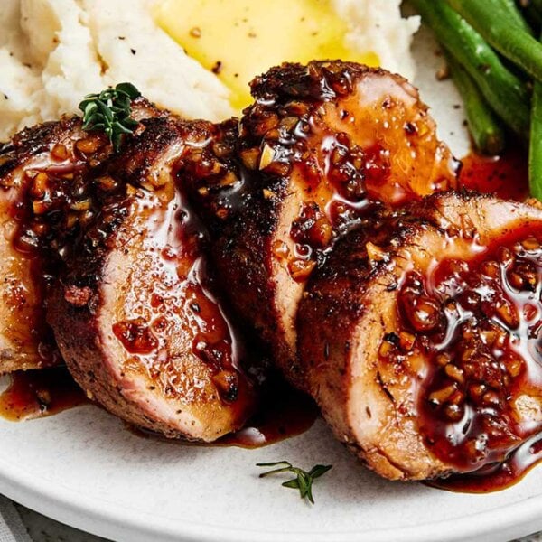 Slices of honey garlic pork tenderloin.