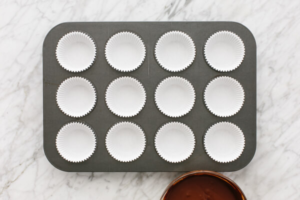 Muffin tin lined for almond butter cups