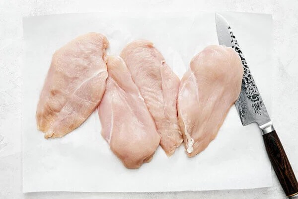 Slicing chicken for chicken piccata