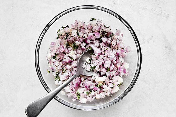 A bowl of shallot mixture.