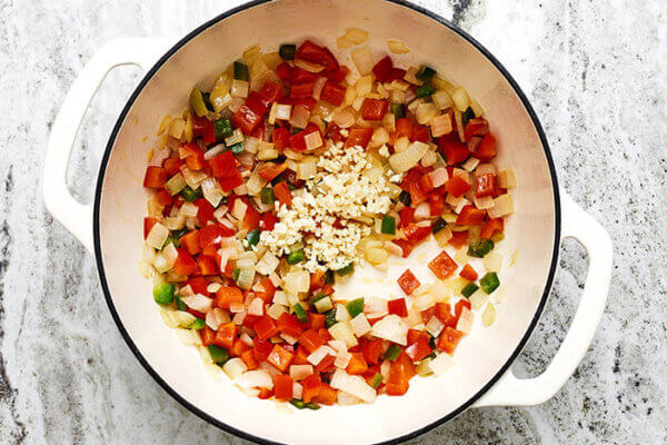 Sauteed veggies in a pot for turkey chili