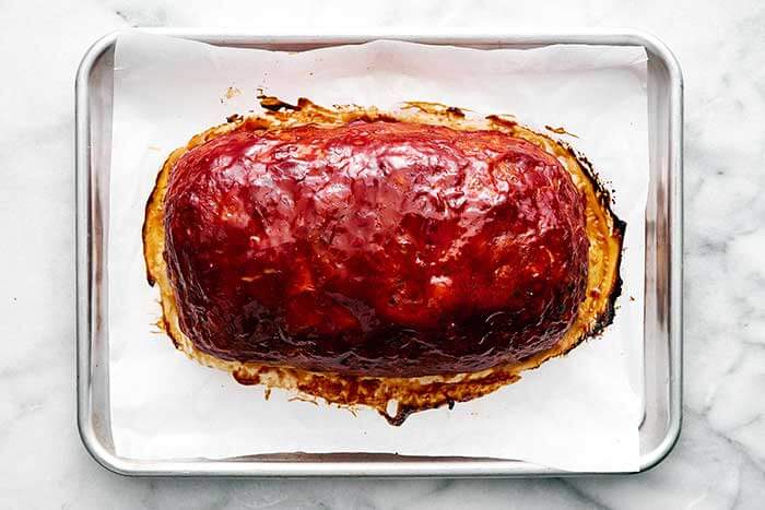 Cooked turkey meatloaf on a pan.