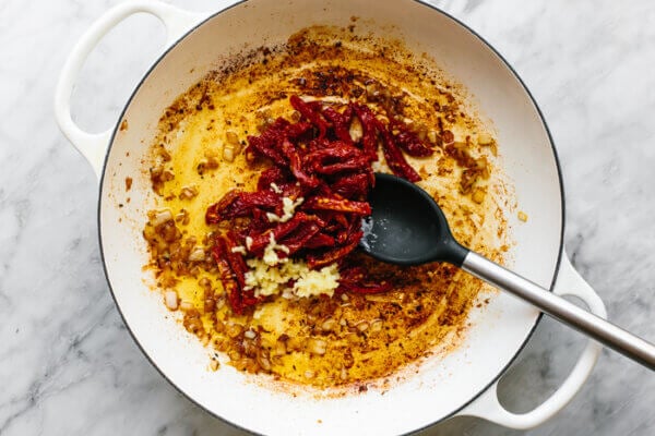 Sun-dried tomatoes in a skillet for tuscan chicken