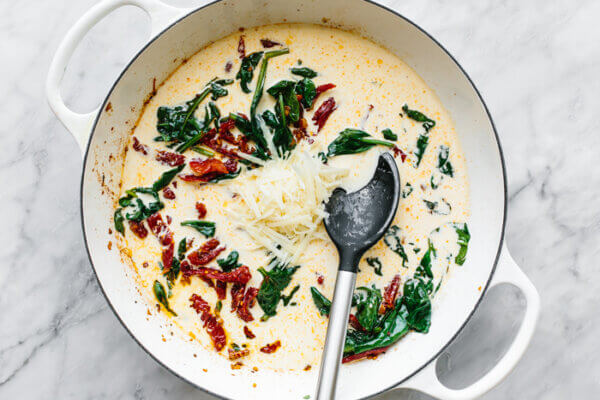 Creamy tuscan sauce in a skillet