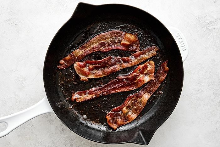 Cooked bacon in a pan.