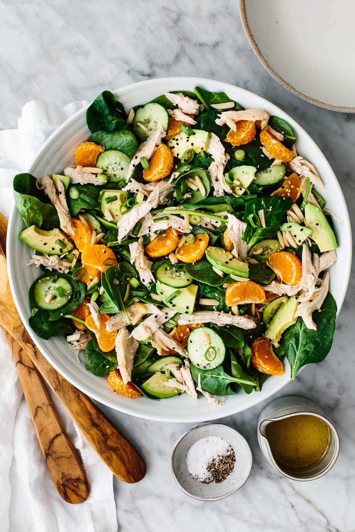 A large bowl of mandarin chicken salad.