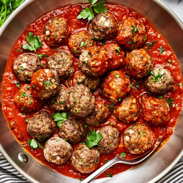 A pan of meatballs in marinara sauce