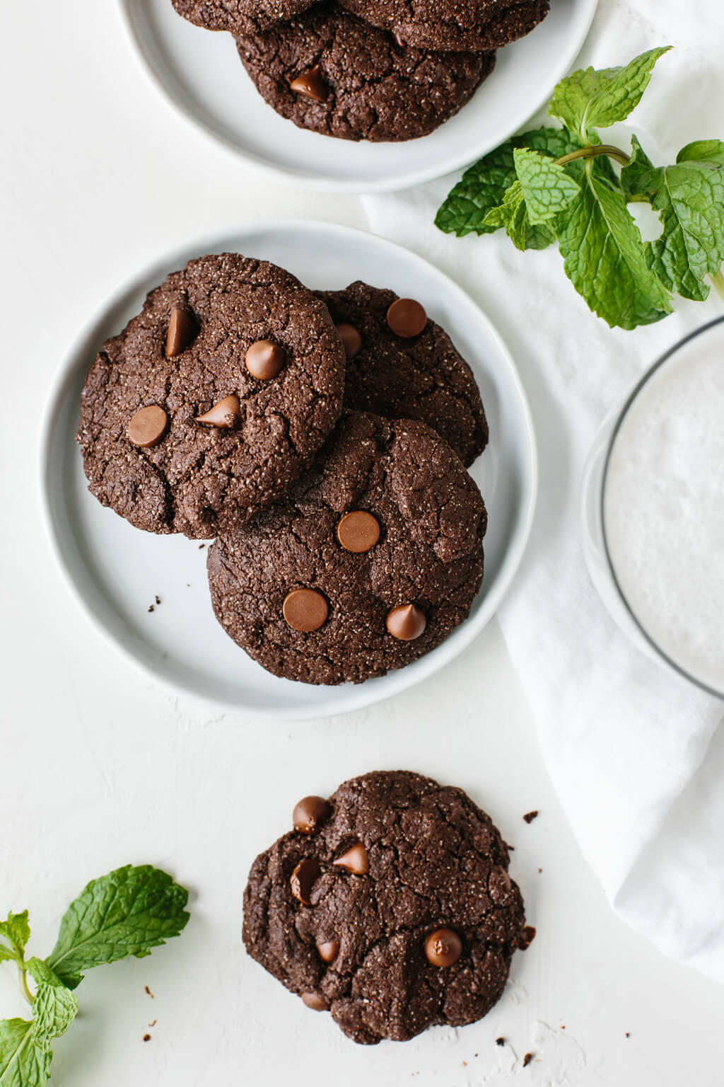 These gluten-free, paleo-friendly mint double chocolate cookies are rich, decadent and highly addictive. They're firm on the outside and lusciously soft on the inside.