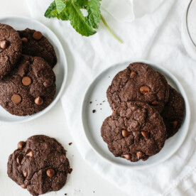 These gluten-free, paleo-friendly mint double chocolate cookies are rich, decadent and highly addictive. They're firm on the outside and lusciously soft on the inside.