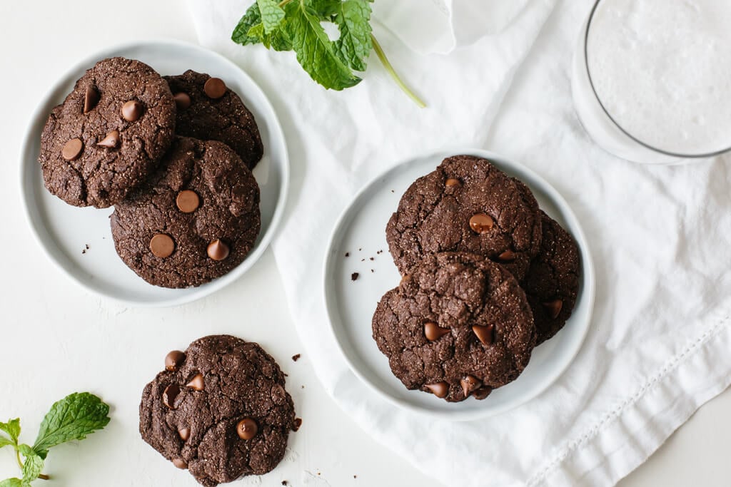 These gluten-free, paleo-friendly mint double chocolate cookies are rich, decadent and highly addictive. They're firm on the outside and lusciously soft on the inside.