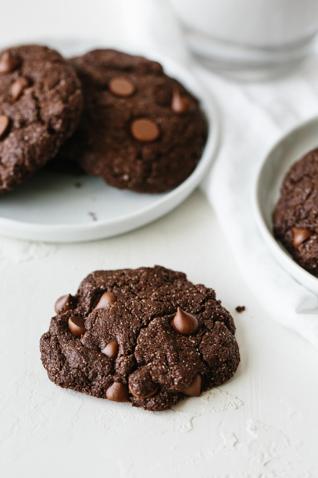 These gluten-free, paleo-friendly mint double chocolate cookies are rich, decadent and highly addictive. They're firm on the outside and lusciously soft on the inside.