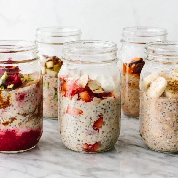 Six jars of overnight oats.