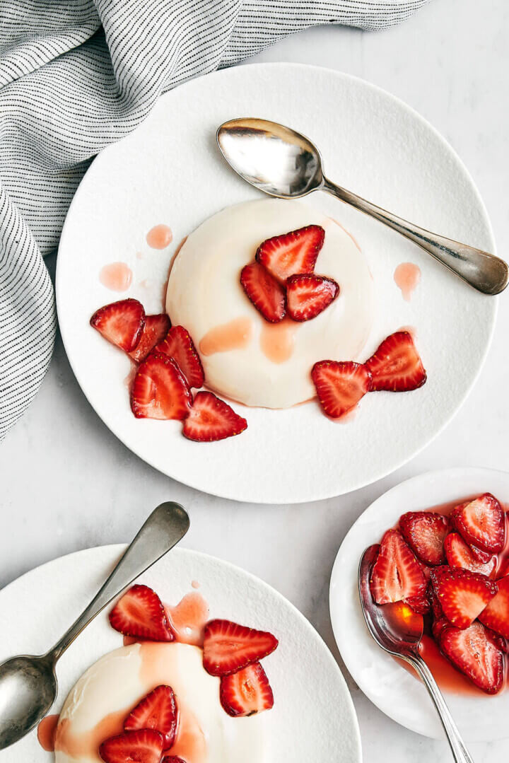 A white plate of panna cotta