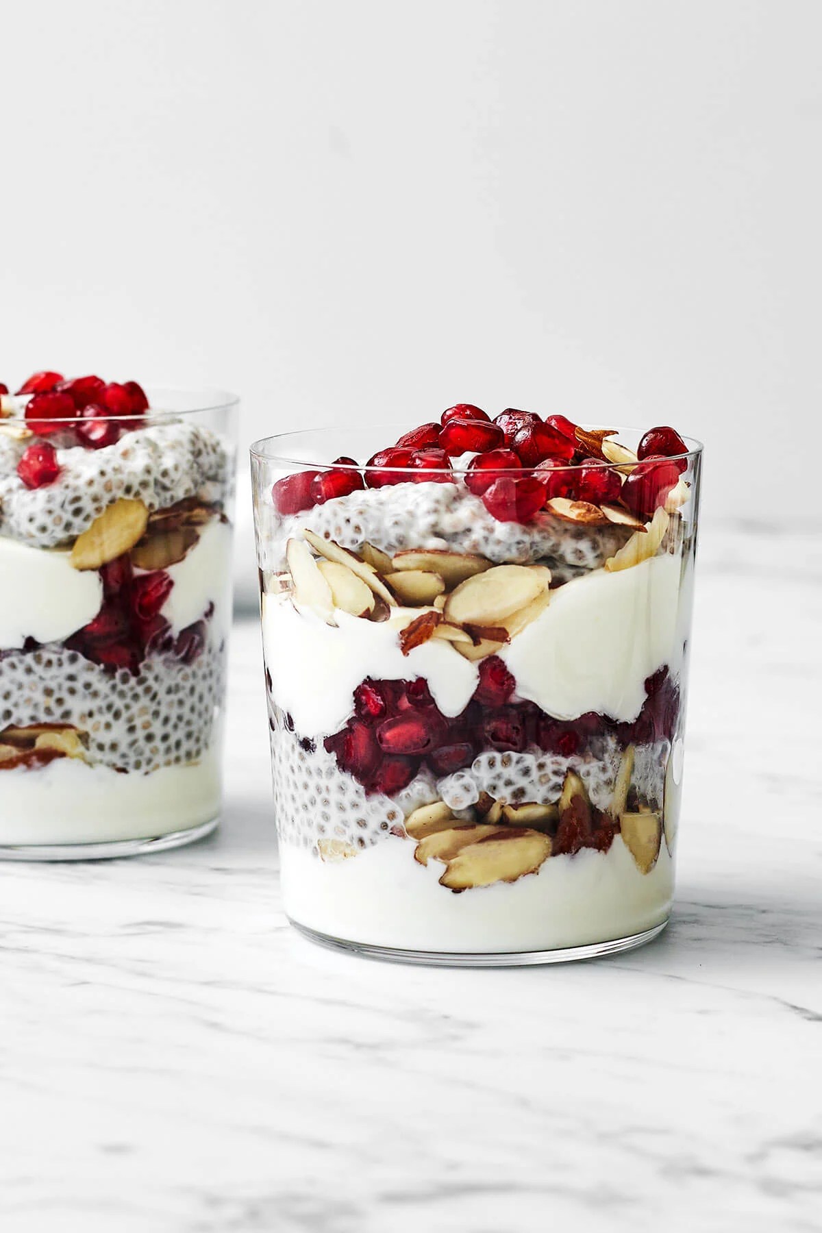 Glass of pomegranate chia pudding parfait