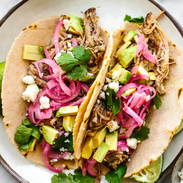 A plate of pulled pork tacos