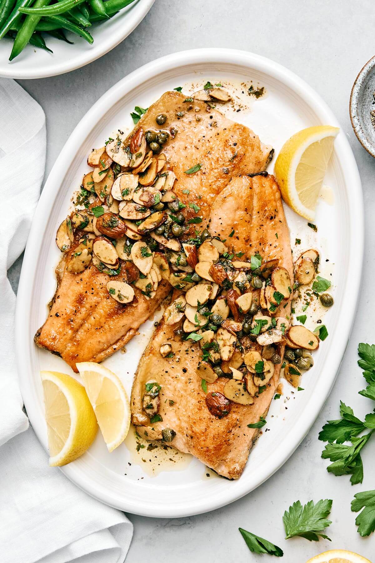 A plate of rainbow trout almondine.