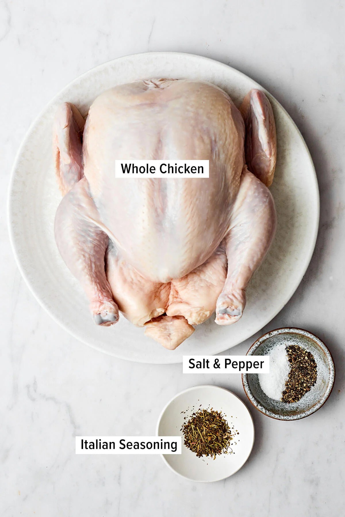 Ingredients for roast chicken on a table