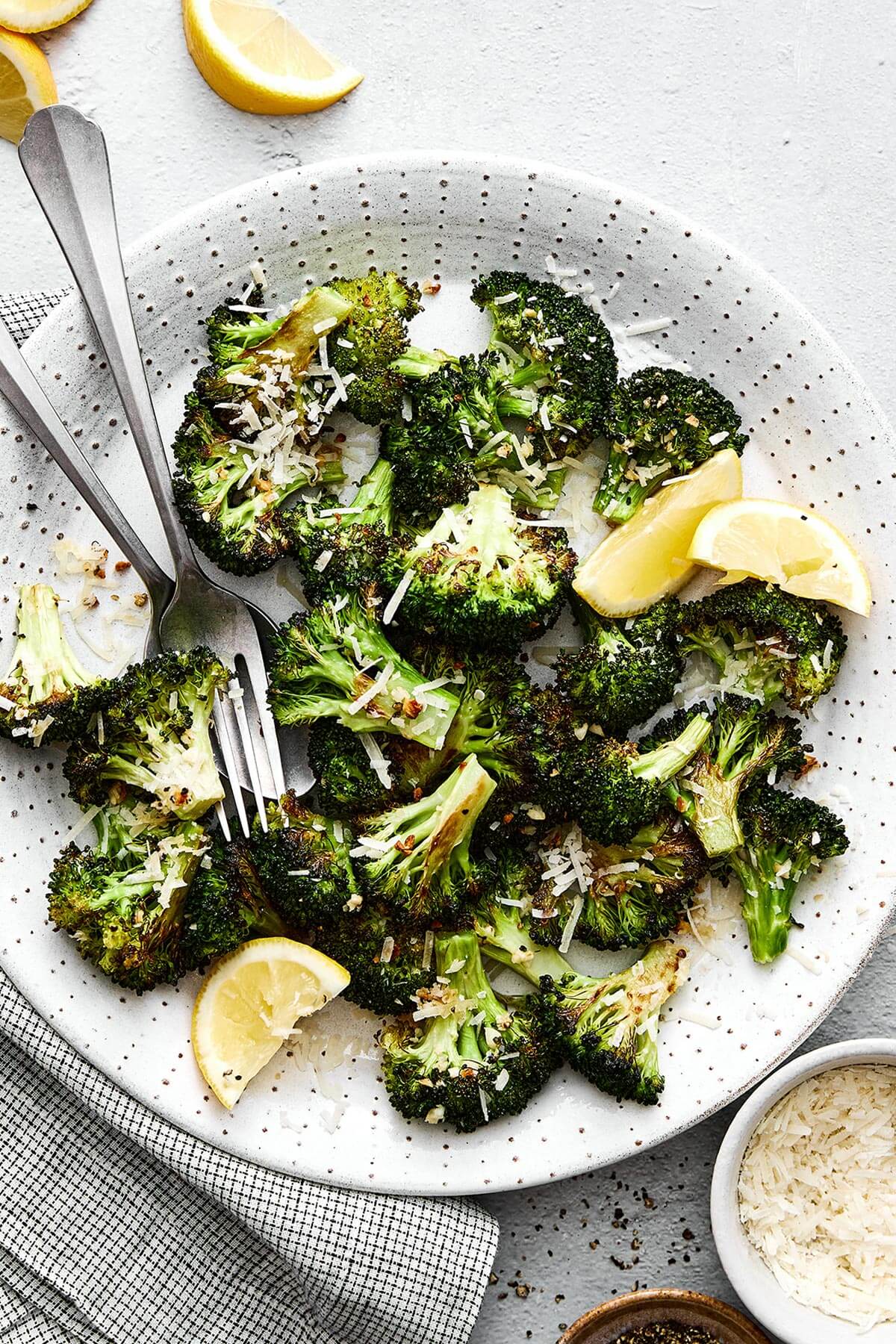 A plate of roasted broccoli.