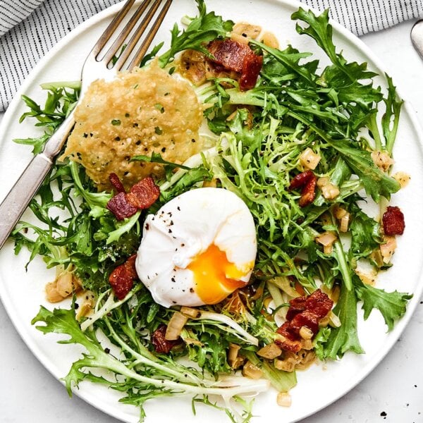 A plate of classic salad lyonnaise.