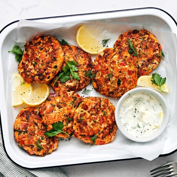 A casserole dish with salmon patties.