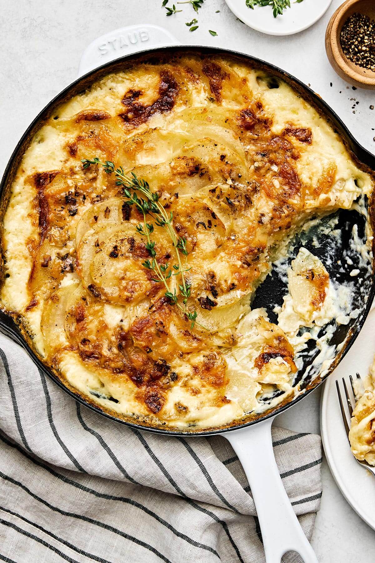 Scalloped potatoes in a pan.