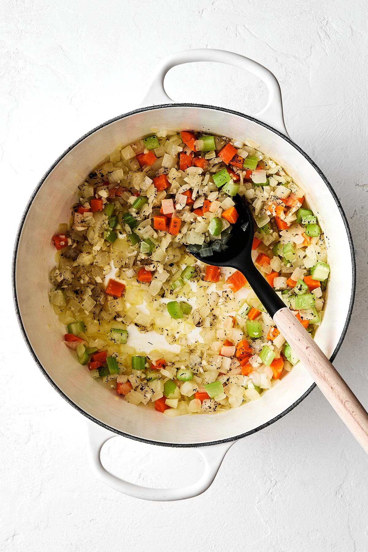 Cooking veggies with herbs.