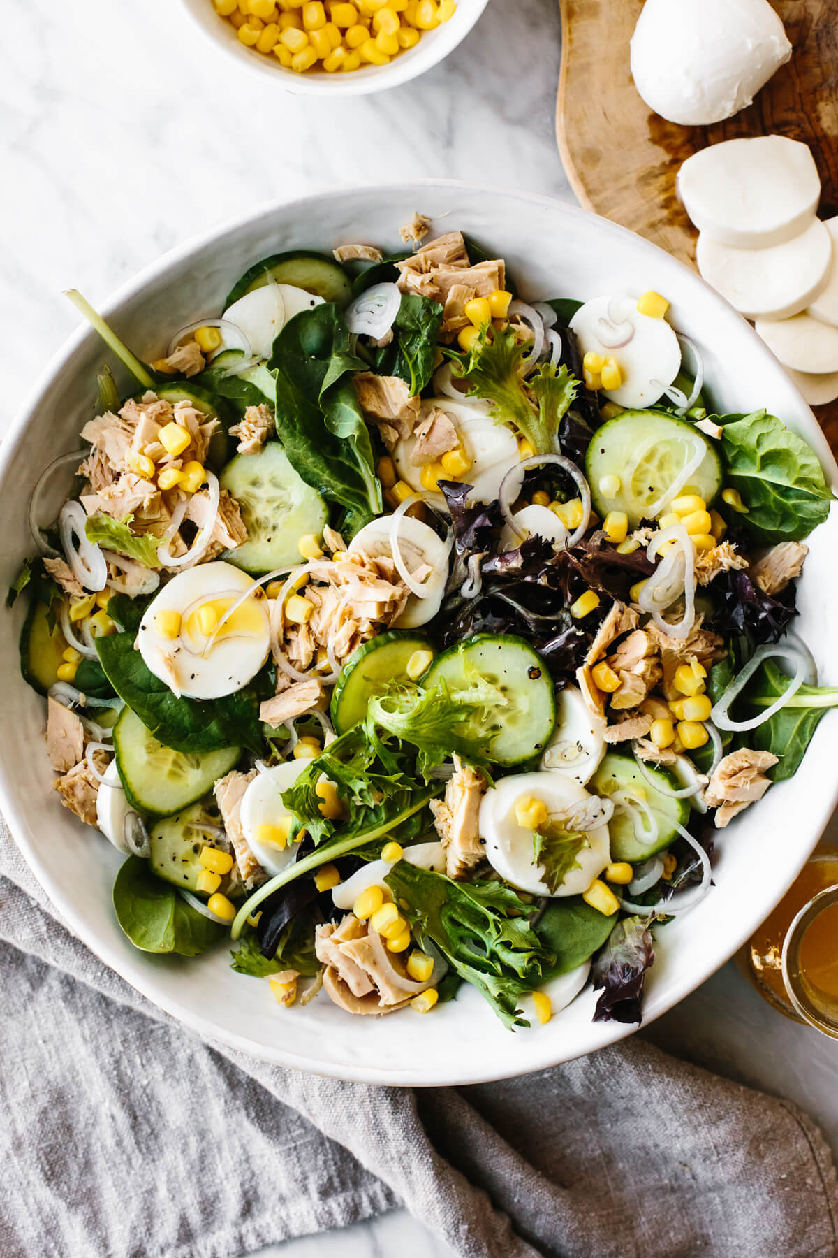 Tuna, cucumber, mozzarella salad in a bowl