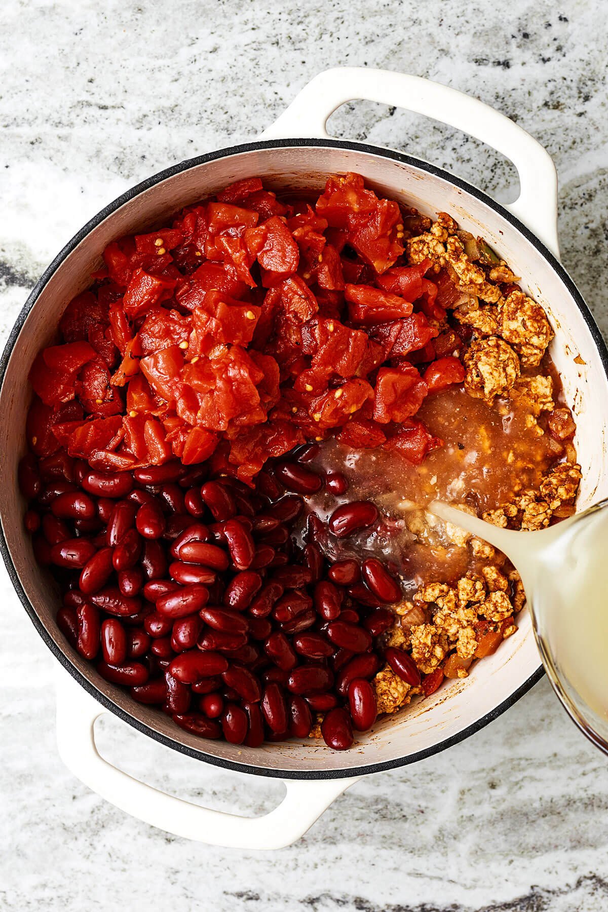 Making turkey chili in a large pot