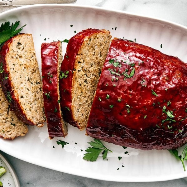 Turkey meatloaf slices on a plate.